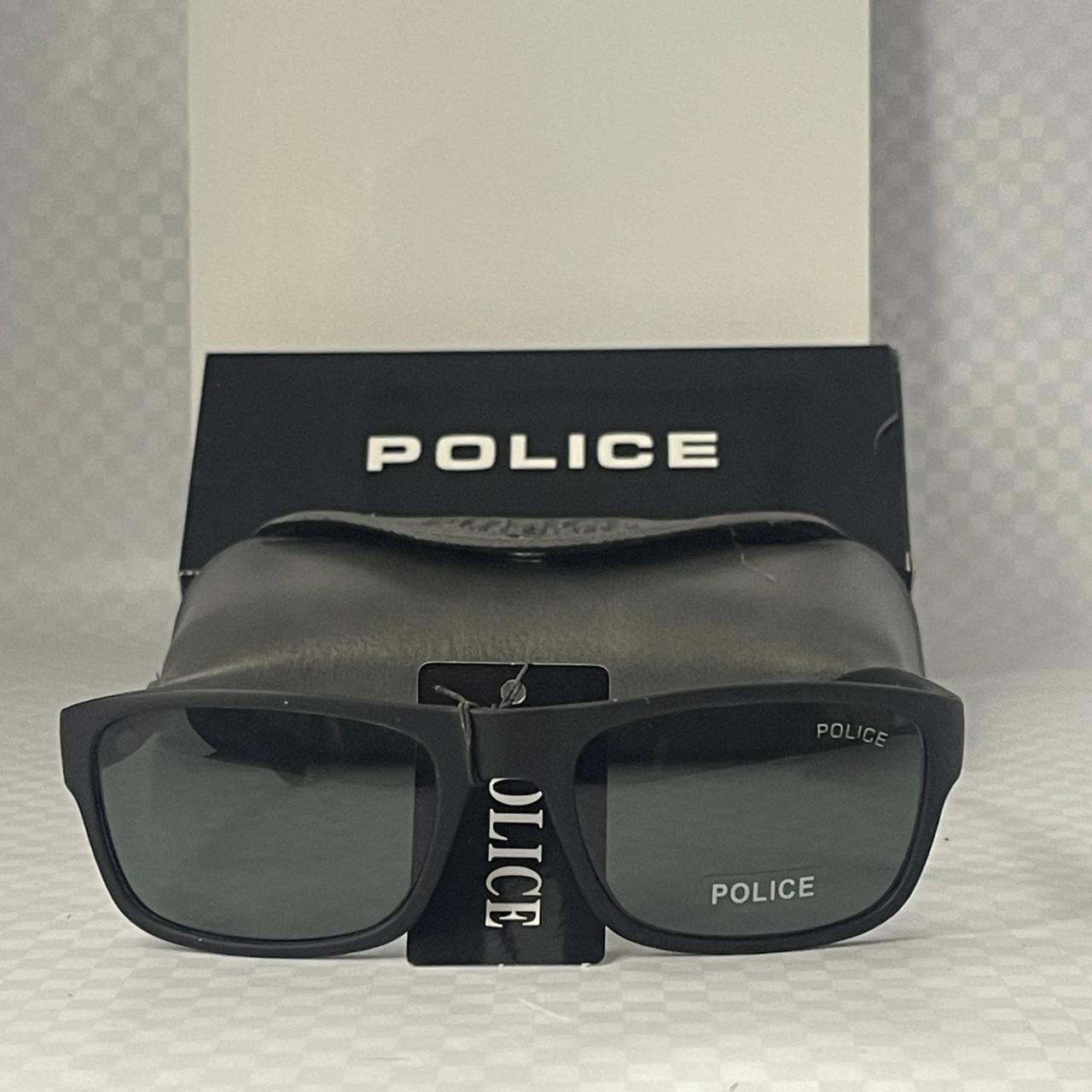 The golden side detail with “POLICE”