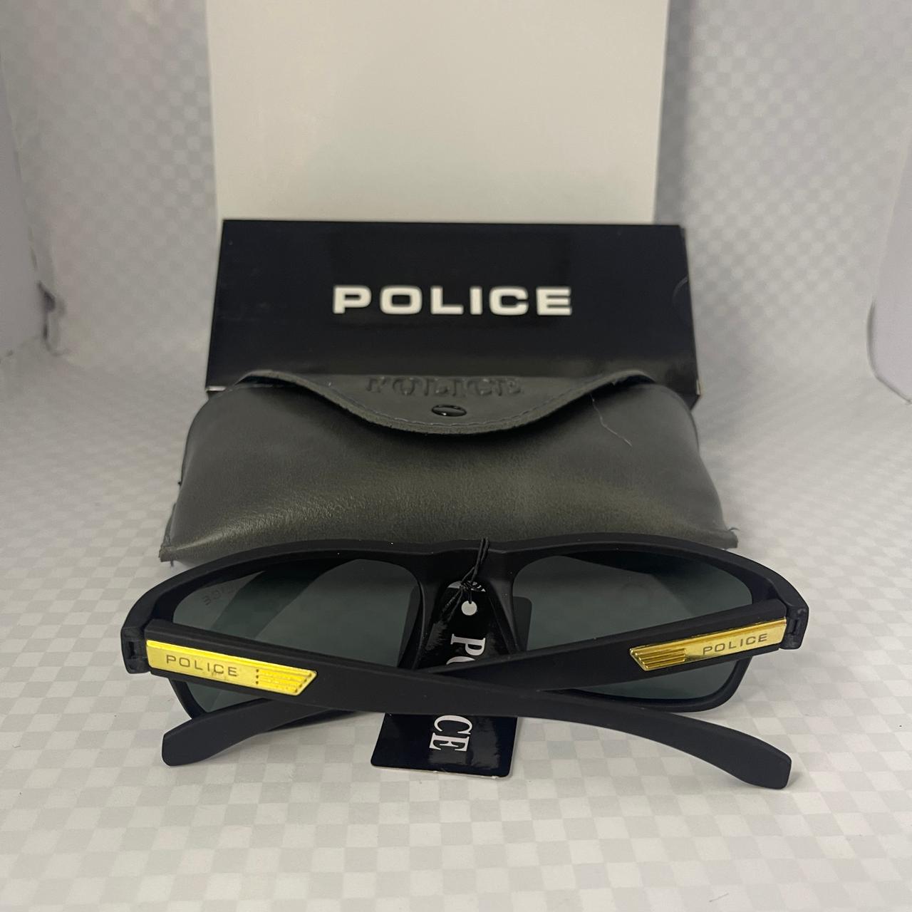 The golden side detail with “POLICE”